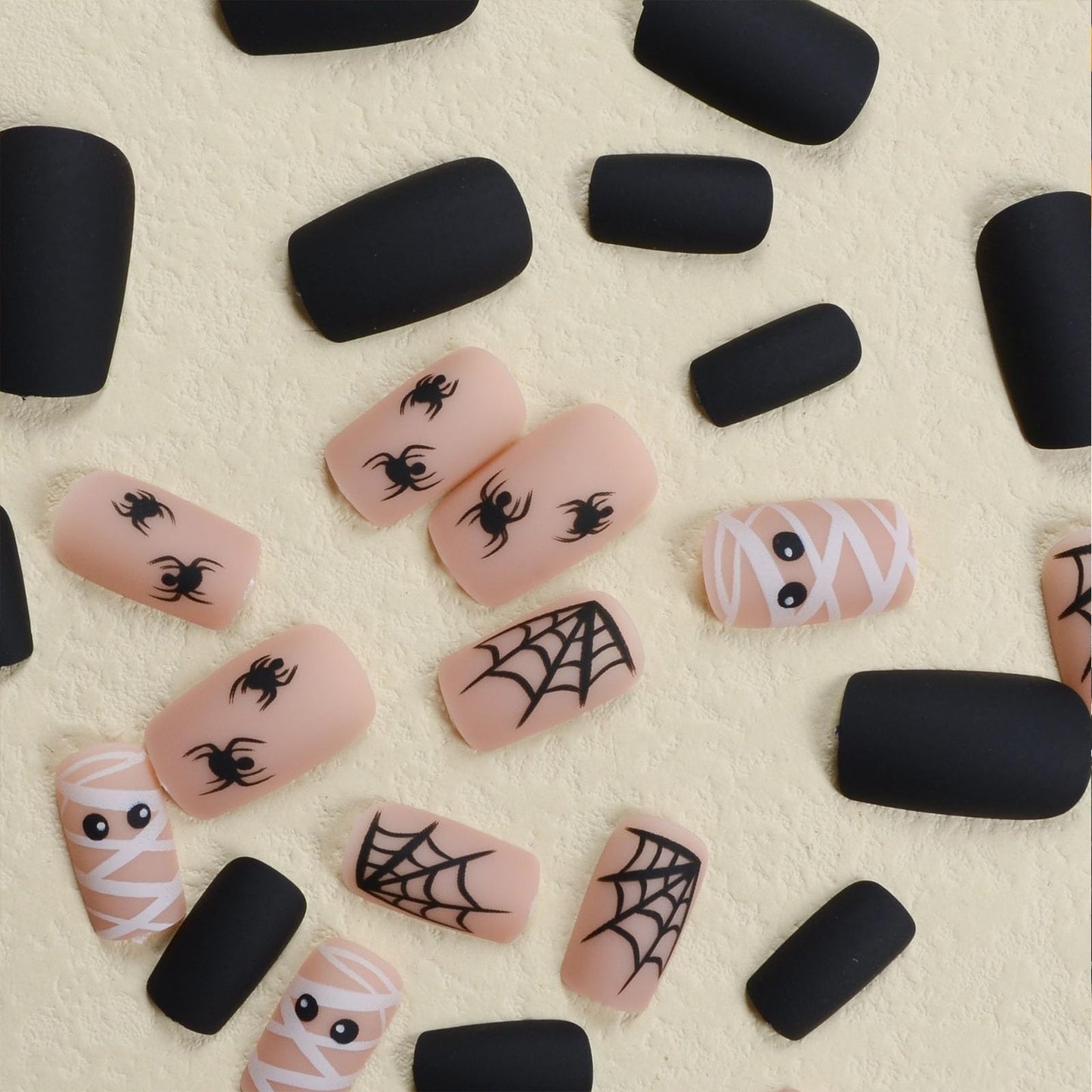 Halloween Press on Nails Medium Square Fake Nails Matte Glue on nails Nude False Nails with Cute Mummy Spiders Webs Design Halloween Nails Black Full Cover Stick on Nails for Women Girls 24 Pcs