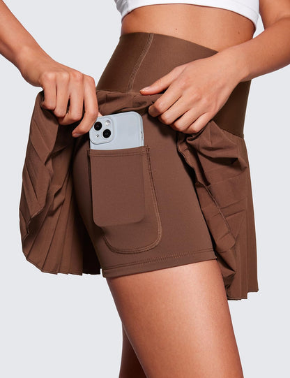 CRZ YOGA Women's High Waisted Pleated Tennis Skirts with Pockets Tummy Control Casual Liner A Line Workout Golf Skorts Coffee Brown Small