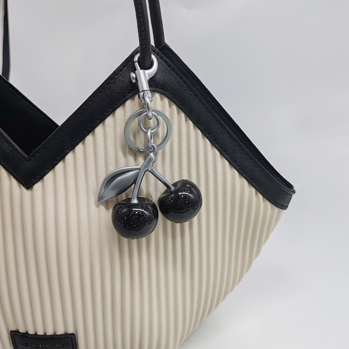 EIOYUMY Cherry Keychain Pendant Bag Charm for Women, Shiny Resin & Metal Accessories for Purses and Handbags (Black)