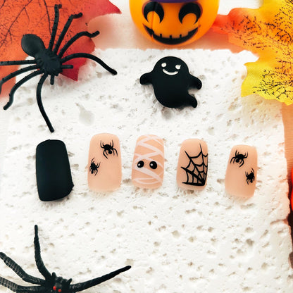 Halloween Press on Nails Medium Square Fake Nails Matte Glue on nails Nude False Nails with Cute Mummy Spiders Webs Design Halloween Nails Black Full Cover Stick on Nails for Women Girls 24 Pcs