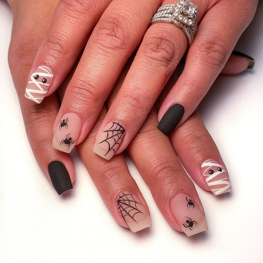 Halloween Press on Nails Medium Square Fake Nails Matte Glue on nails Nude False Nails with Cute Mummy Spiders Webs Design Halloween Nails Black Full Cover Stick on Nails for Women Girls 24 Pcs