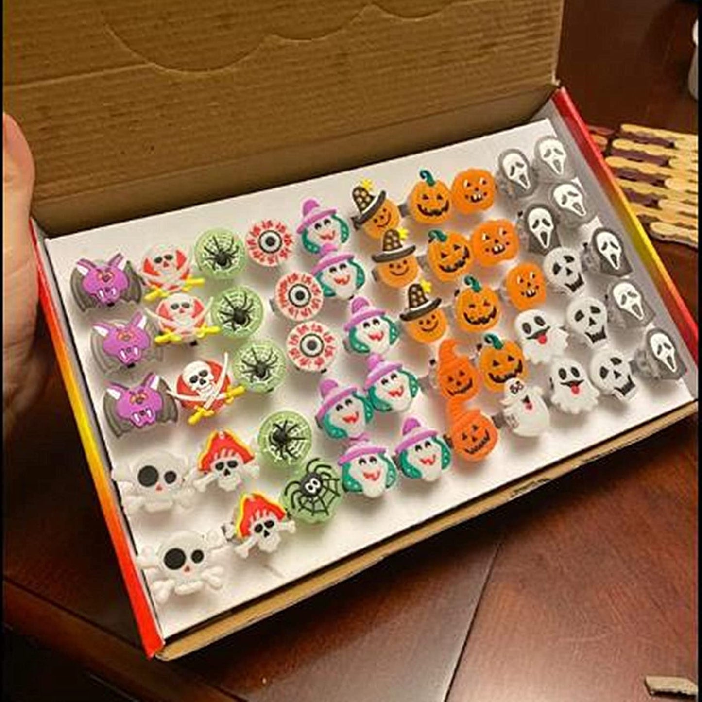 Halloween Light Up Rings 50Pcs Halloween Party Favors for kid Light Up Treat Glowing LED Ring for Kids Adults