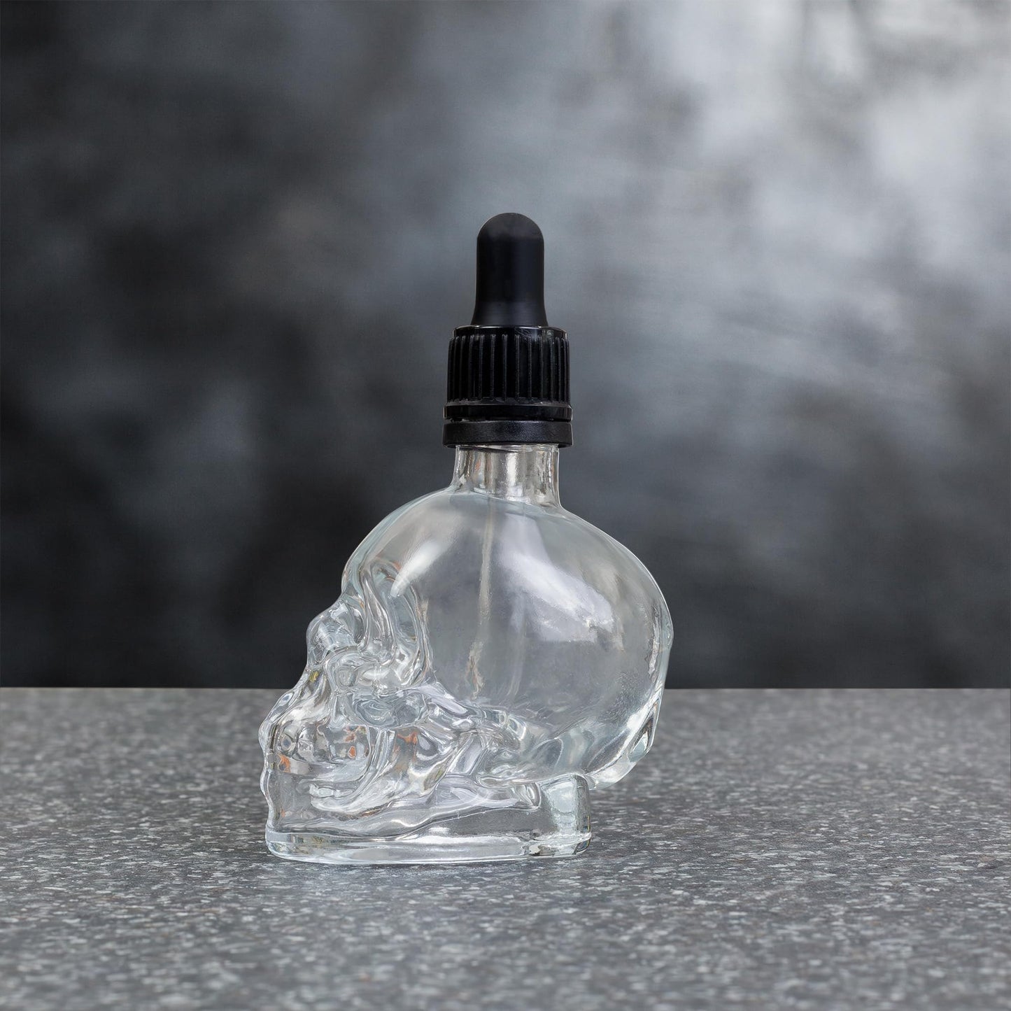 Cornucopia Skull Glass Dropper Bottles (2-Pack, 2oz, Clear); Bitter Flavor Tattoo and Beard Oil Dispenser