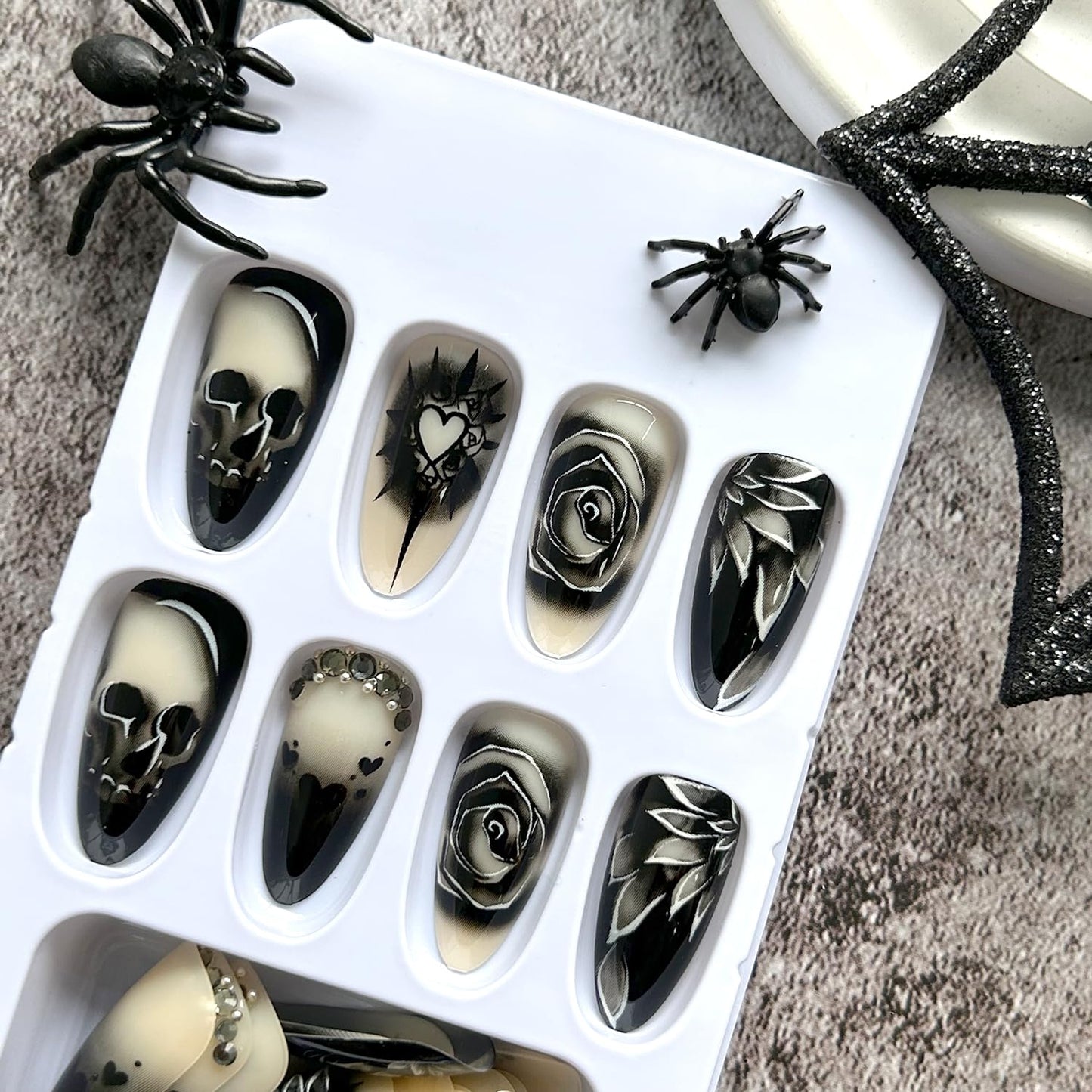 KKUUOO Stiletto Press-on Nails - Goth Fake Nails with Skull & Black Rose Design, Rhinestone Full Cover Acrylic Nails, 24pcs for Women, Girls & Halloween Manicure