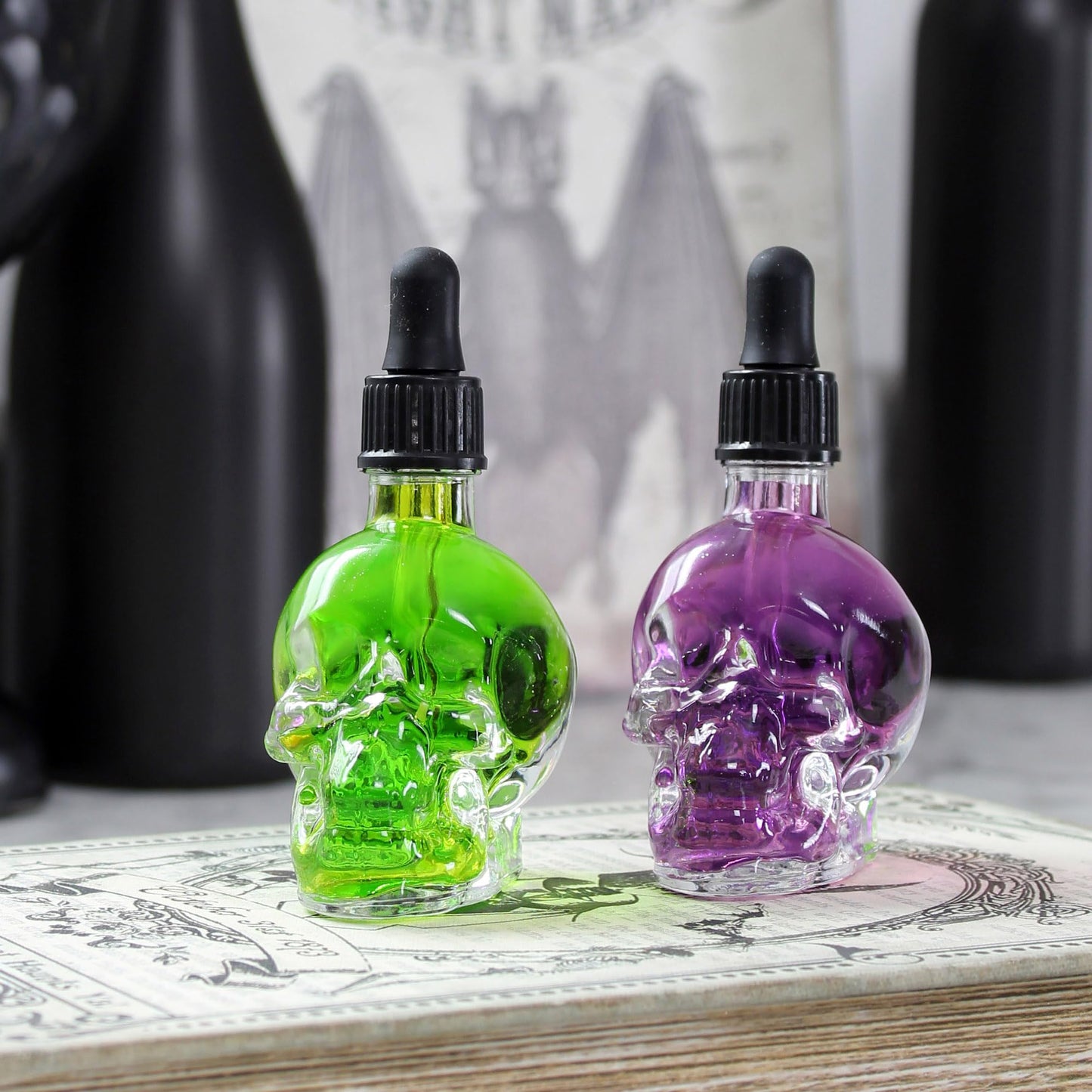 Cornucopia Skull Glass Dropper Bottles (2-Pack, 2oz, Clear); Bitter Flavor Tattoo and Beard Oil Dispenser