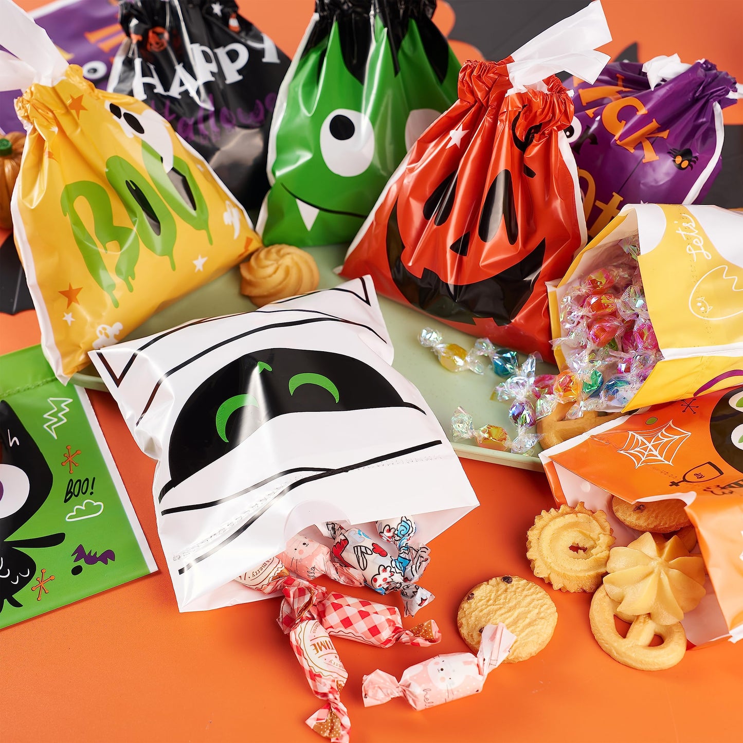 JOYIN 108 PCS Halloween Drawstring Treat Bags with 9 Character Designs, Mini Halloween Goodie Candy Bags, Plastic Gift Bag Bulk for Kids Boys Girls Trick or Treating, Party Favor Supplies