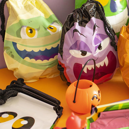 JOYIN 60PCS Halloween Drawstring Treat Bags, Trick or Treating Goodie Candy Small Plastic Gifts Bags Bulk in 12 Cute Monster Designs, Kids Halloween Party Favors Supplies